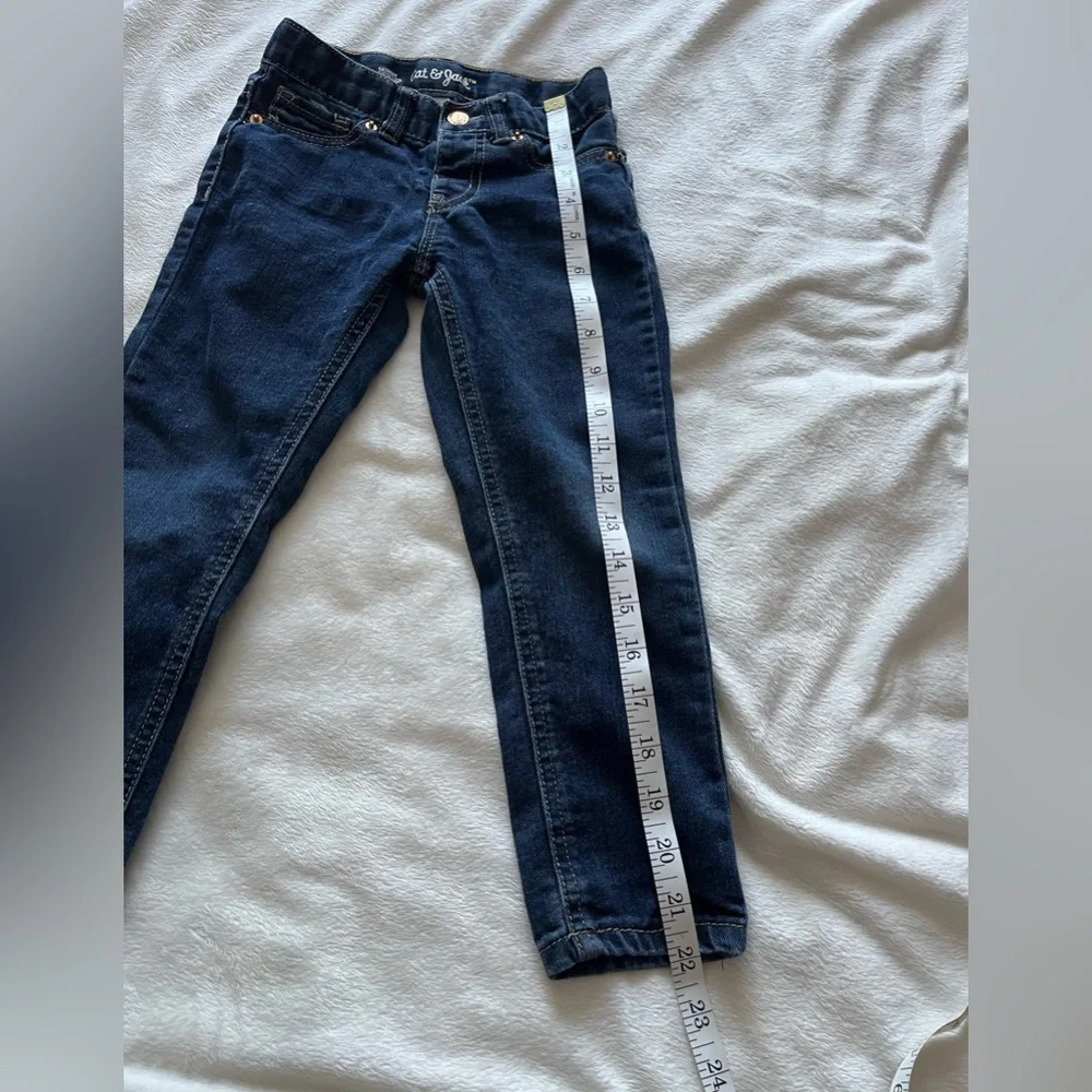 Cat & Jack kids blue jeans size 4T. Gold stitching around pockets.